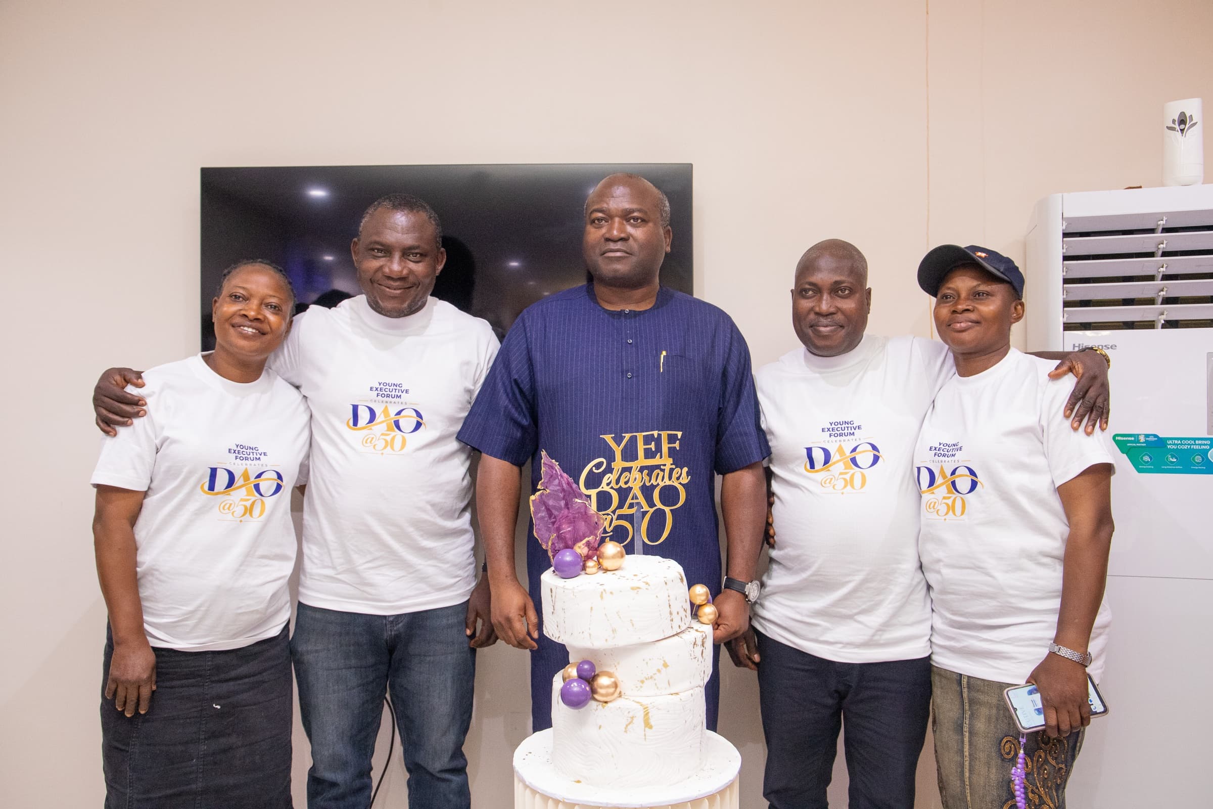 Dr. Ogunsan with forum members in DAO @50 shirts